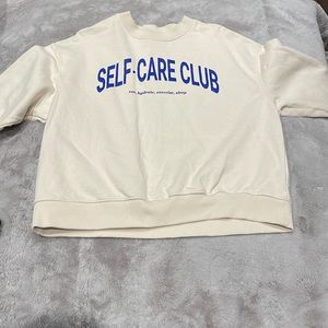Self care club sweater from H&M